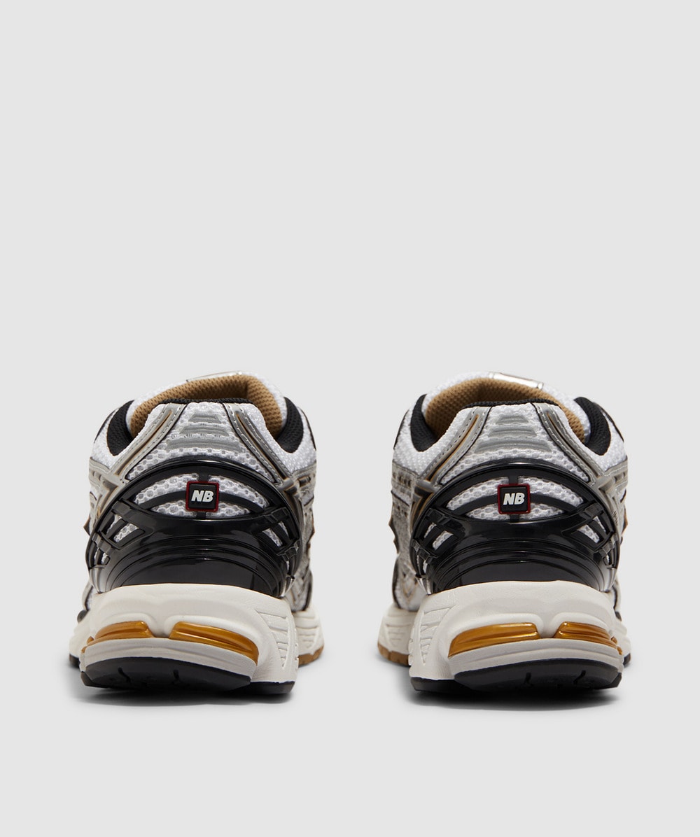 New Balance 1906 sneaker | WHITE BLACK GOLD | SEVENSTORE
