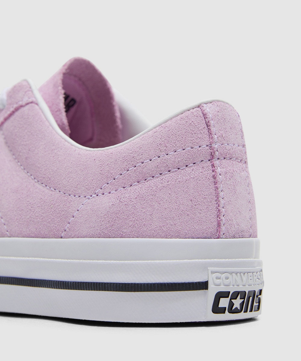 Pink suede converse one star sales