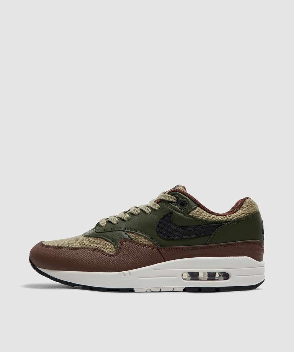 Olive green nikes 2025