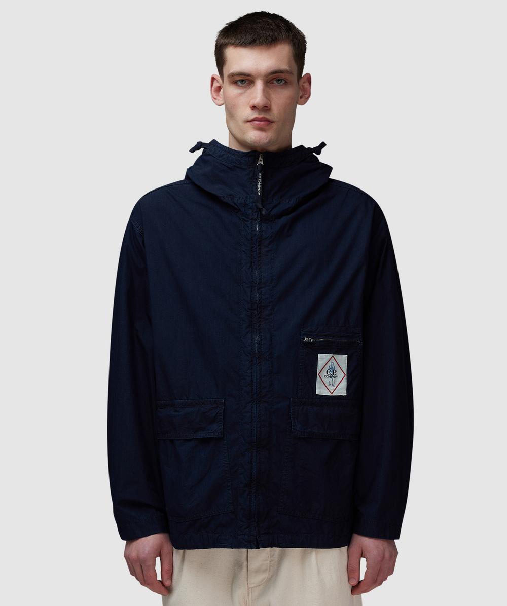 C.P. Company 50 Fili Indigo Goggle Jacket (Insignia Blue - M) - Size Clothing & Accessories > Clothing > Outerwear > Coats & Jackets, Male