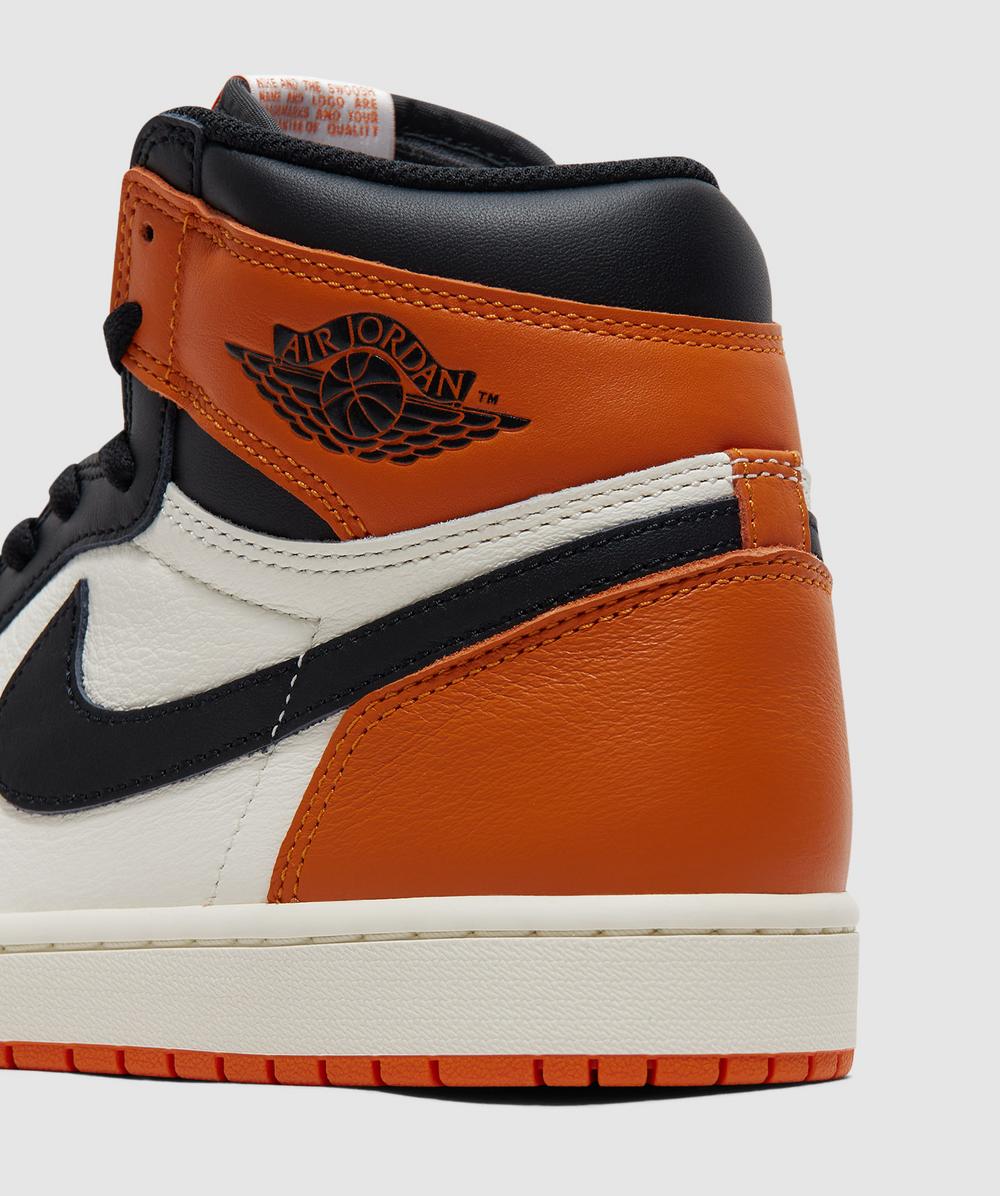 orange air jordan 1s