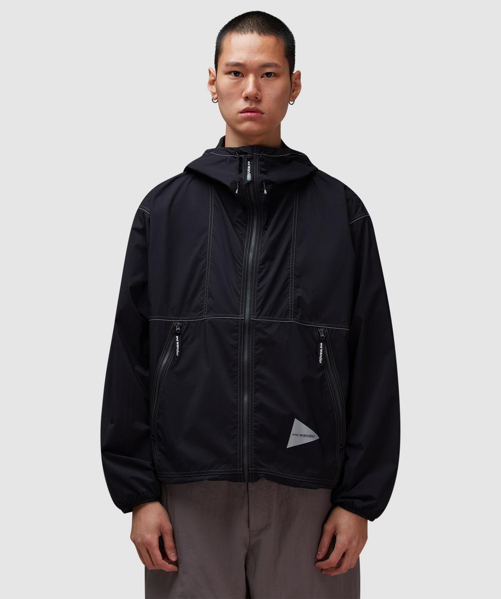 And Wander Pertex Wind Jacket In Black
