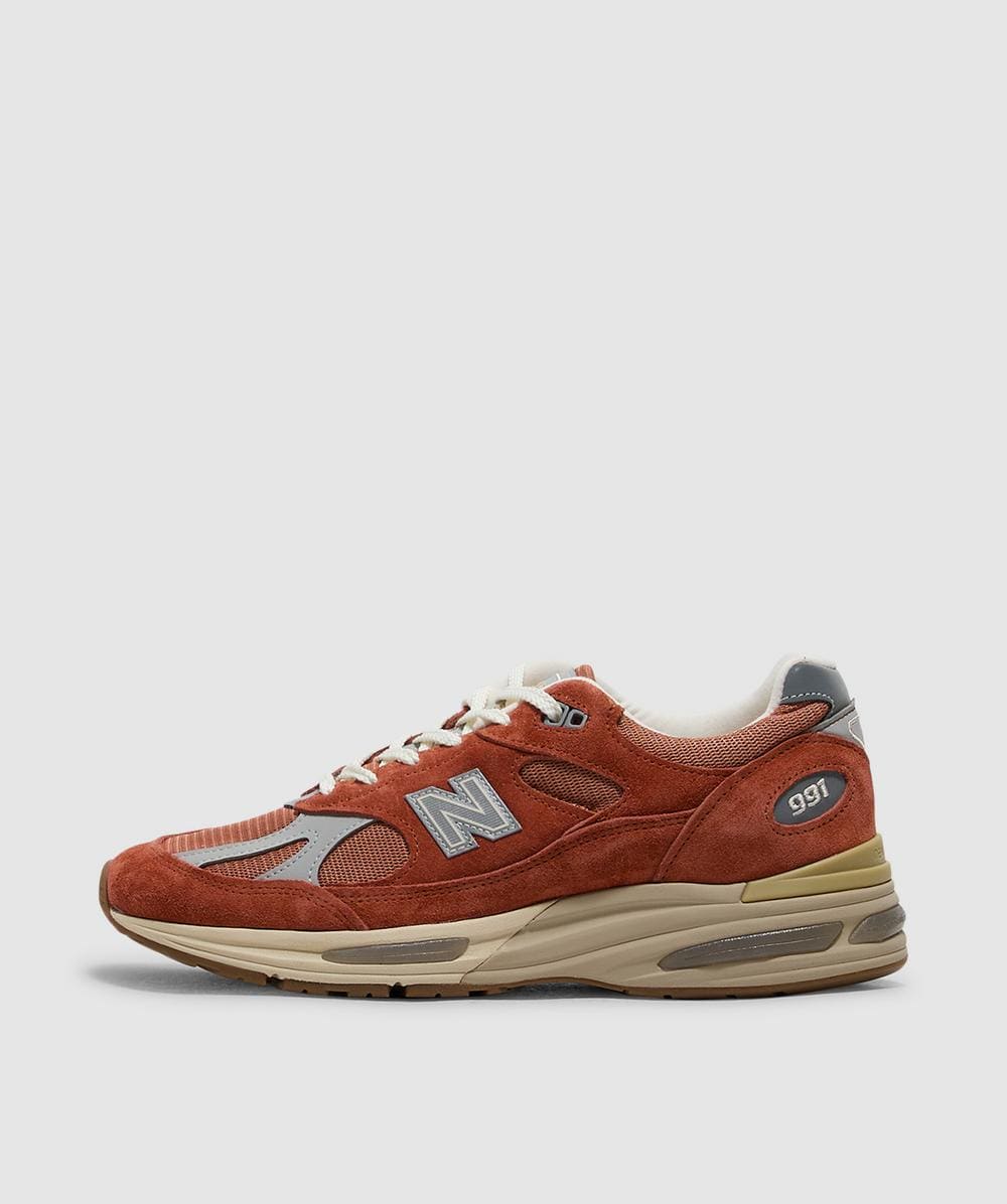 New Balance Men's Orange Miuk 991V2 Sneaker (Potters Clay / Raw Sienna / Harbor Mist - 9) - Size 9