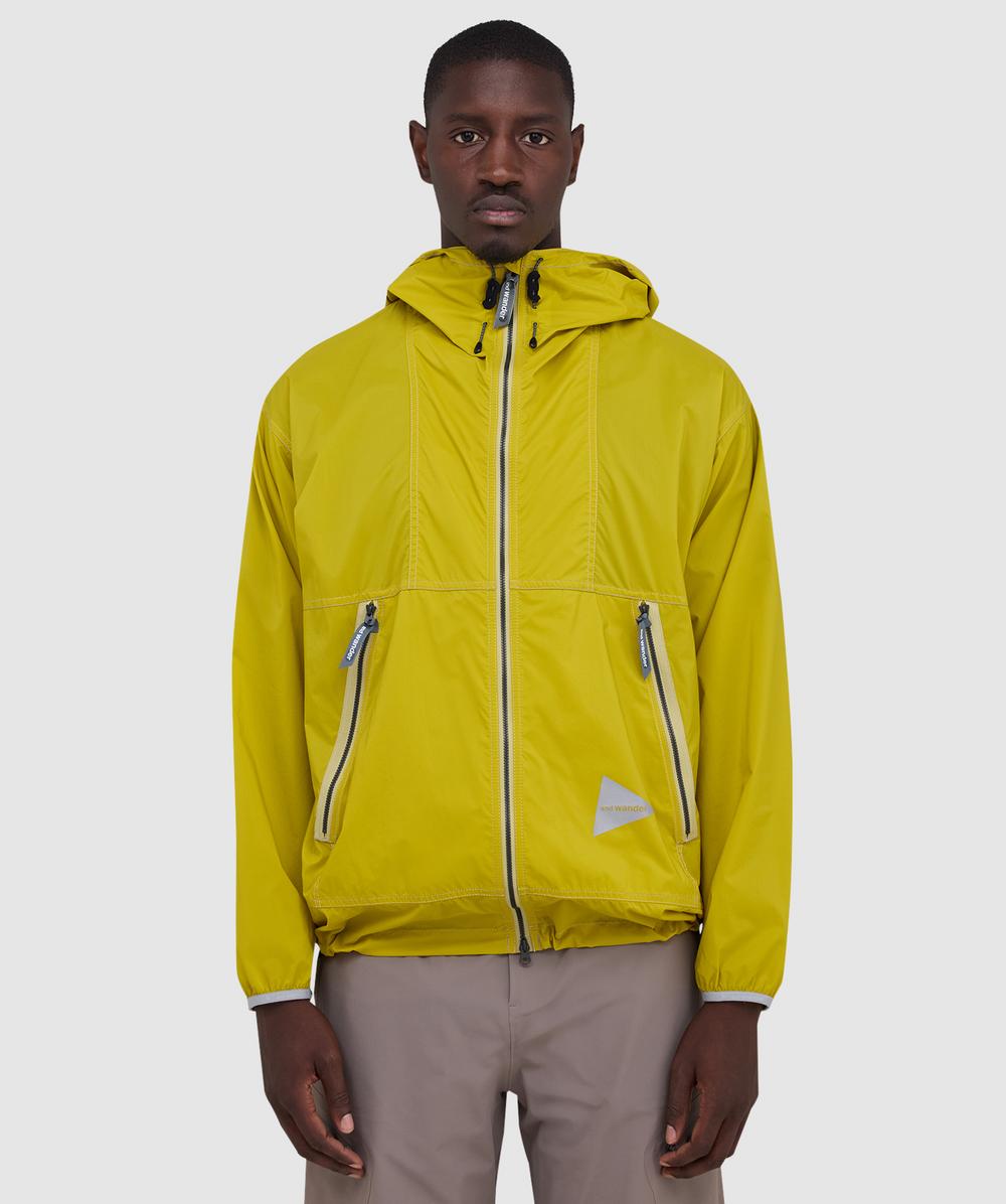 And Wander Pertex Wind Jacket In Yellow
