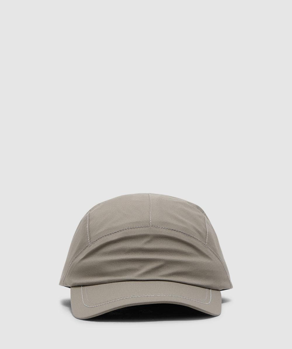 And Wander Pertex Shield Rain Cap In Green
