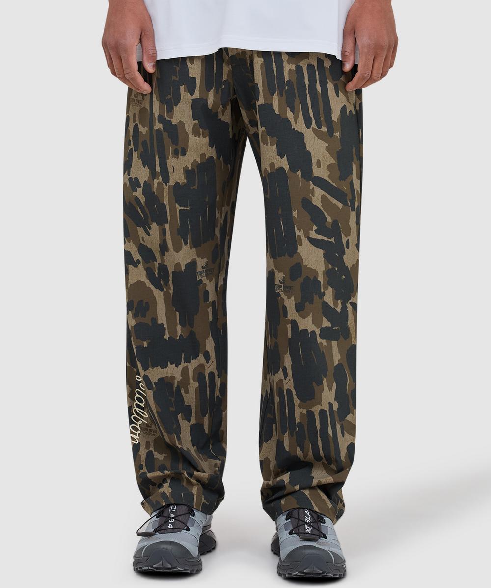 Malbon Golf Condor Tour Divot Camo Pant In Green