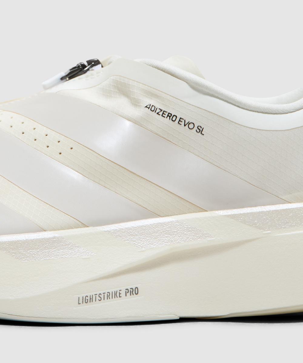 adidas PERFORMANCE Adizero Evo SL zip sneaker | CORE WHITE/ZERO