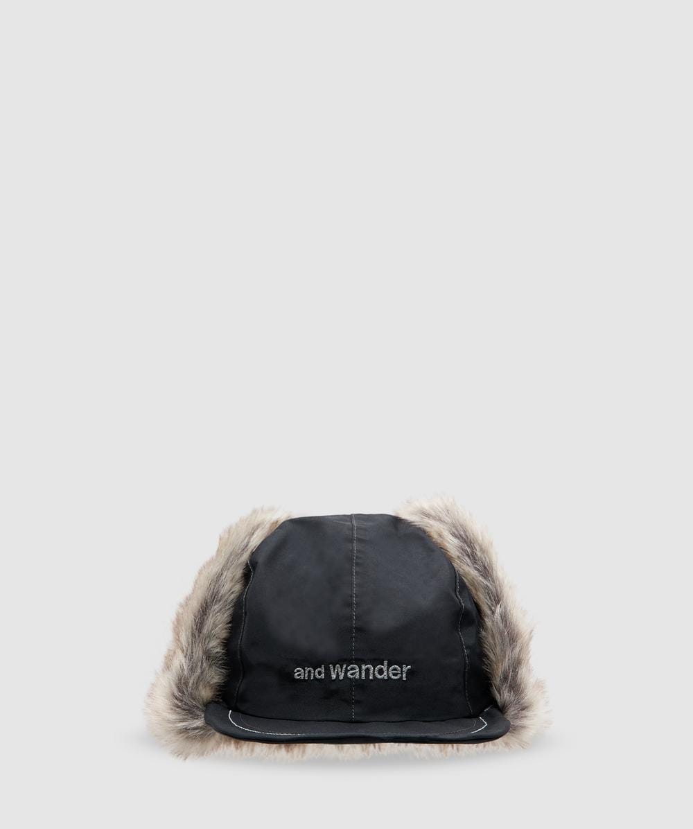 And Wander Rainproof Ear Flap Cap In Black