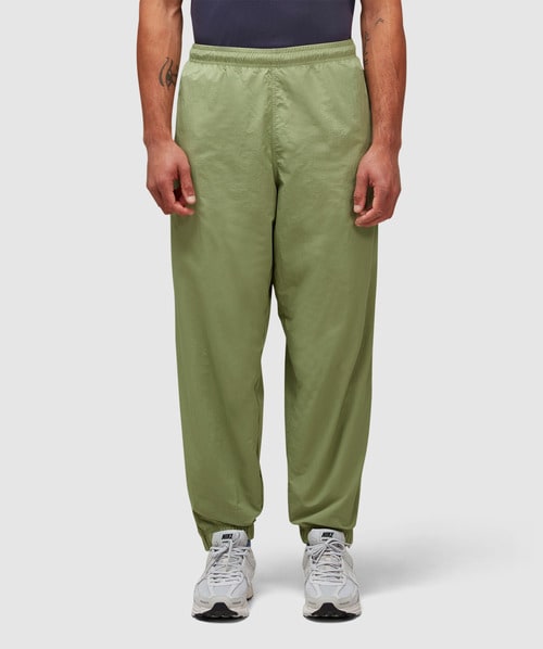 Shop Nike Solo Swoosh Track Pant In Oil Green/white